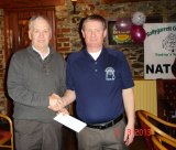 Richard O'Connor collects the Back 9 prize