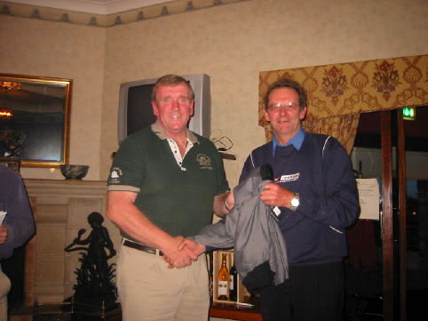 John Lacey Collects a prize