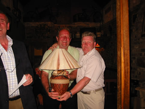 Sponsor Pat Timmons presents a prize to Victor Tomkins, May 2004