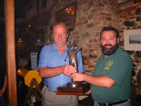 Victor Tomkins, Winner of the first "Schooner" Matchplay competition being presented with the trophy by Jim Kehoe