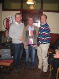 The overall winner receiving his prize from the sponsor Brendan Malone and Captain John Wafer